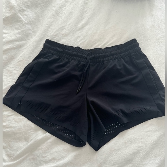 Athleta Baja Perforated Laser Cut Featherweight
Stretch Drawstring Shorts 4 - Picture 2 of 6
